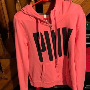 Pink sweater size large worm ones